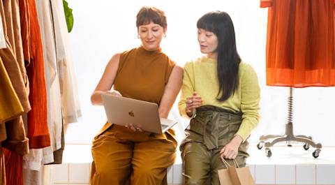 Two women collaborating in a small business