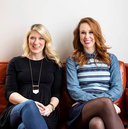 A photo of Karen McKenzie and Scarlett Rosier sitting on a couch together.