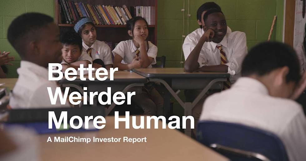 A bunch of children sitting in a classroom