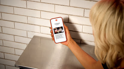 Person on white smartphone