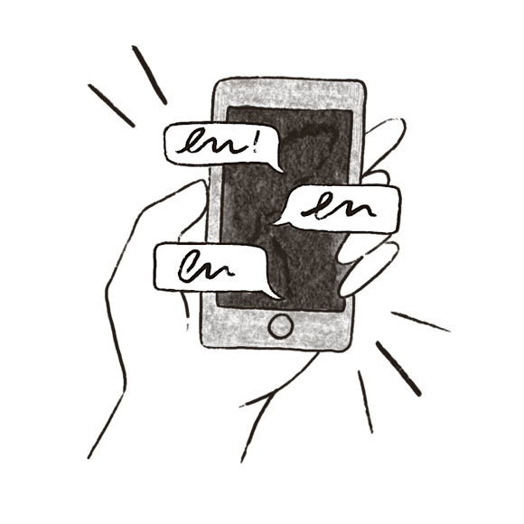 Hand holding phone with messages