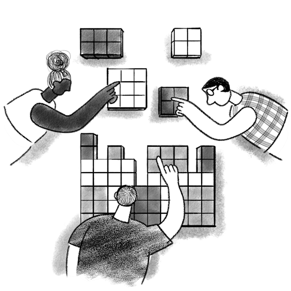 three people moving blocks into place