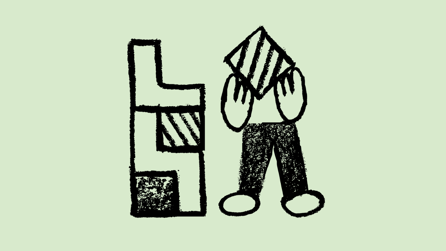 A person holding a block and stacking it on other blocks