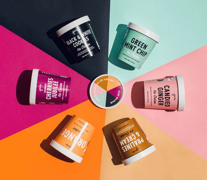 Ice cream pints arranged in a colorful pinwheel pattern with flavor labels, centered around a circular menu chart on a geometric background