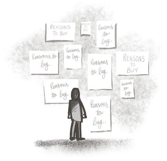 Person ready a handful of signs that say “Reasons to buy”