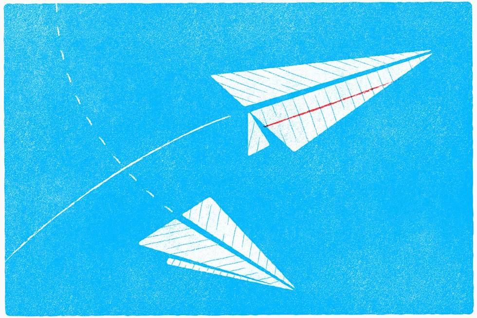 A couple of flying paper airplanes