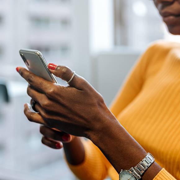 Person holding a phone