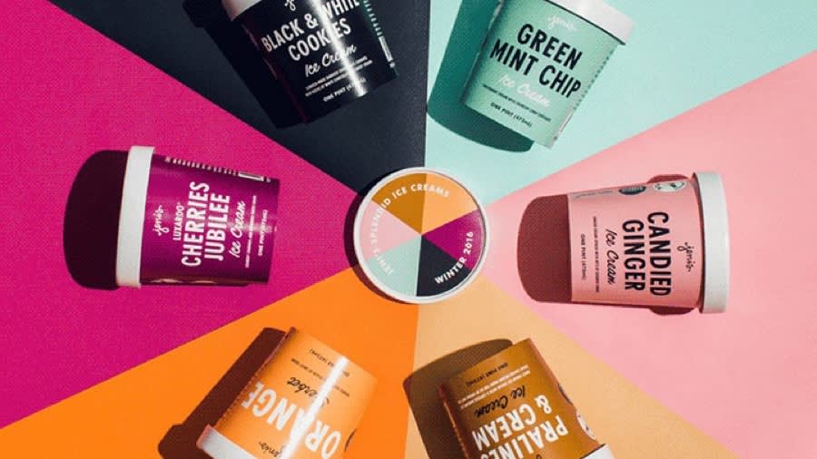 Ice cream pints arranged in a colorful pinwheel pattern with flavor labels, centered around a circular menu chart on a geometric background