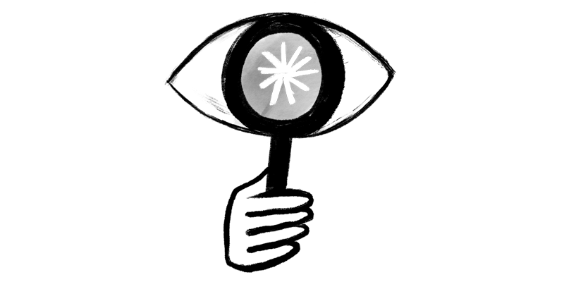 a magnifying glass centered over an eye with an asterisk as the pupil