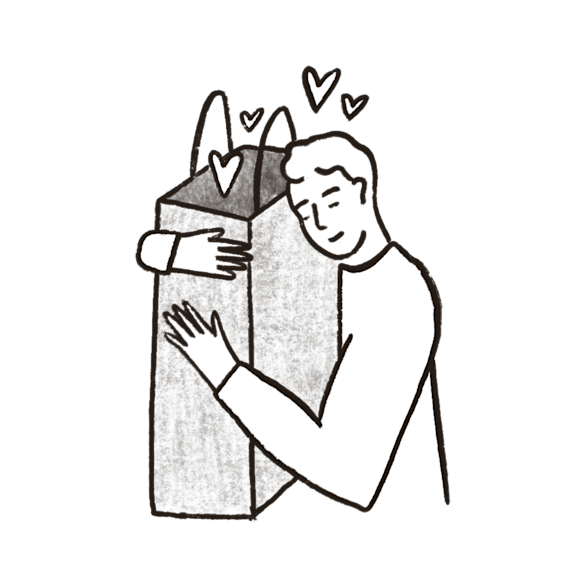 Person hugging a shopping bag