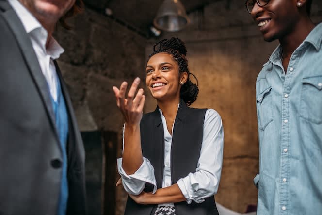 Group of 3 people talking