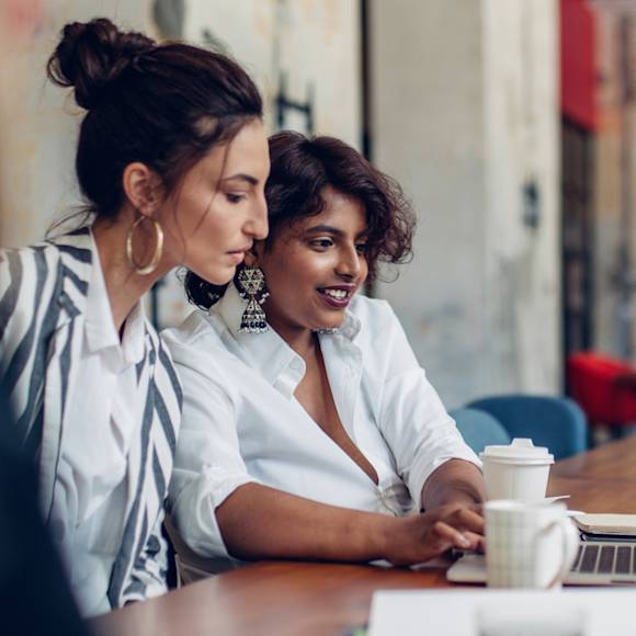 Two women working in a coffee shop