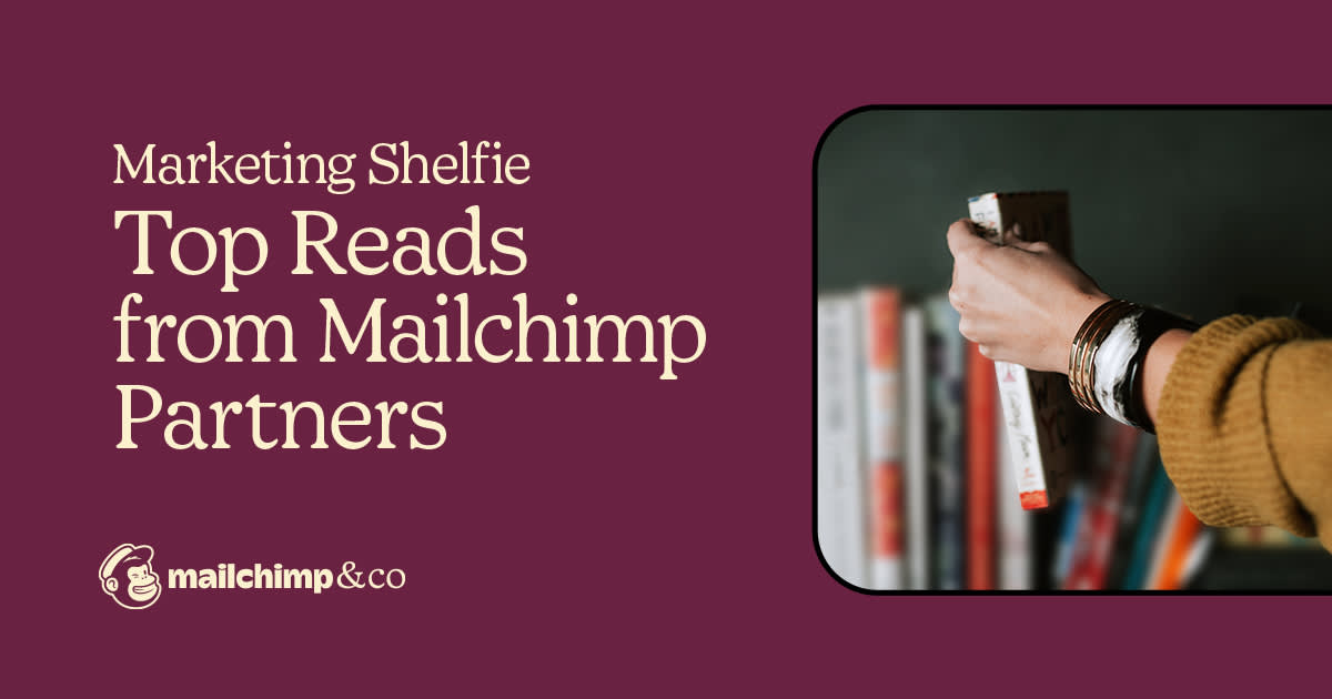 Marketing Shelfie promotional image showing a hand selecting a book from a shelf, with Mailchimp & Co branding on burgundy background
