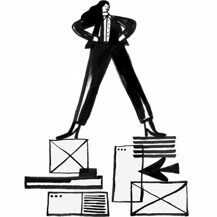 A woman standing on her emails