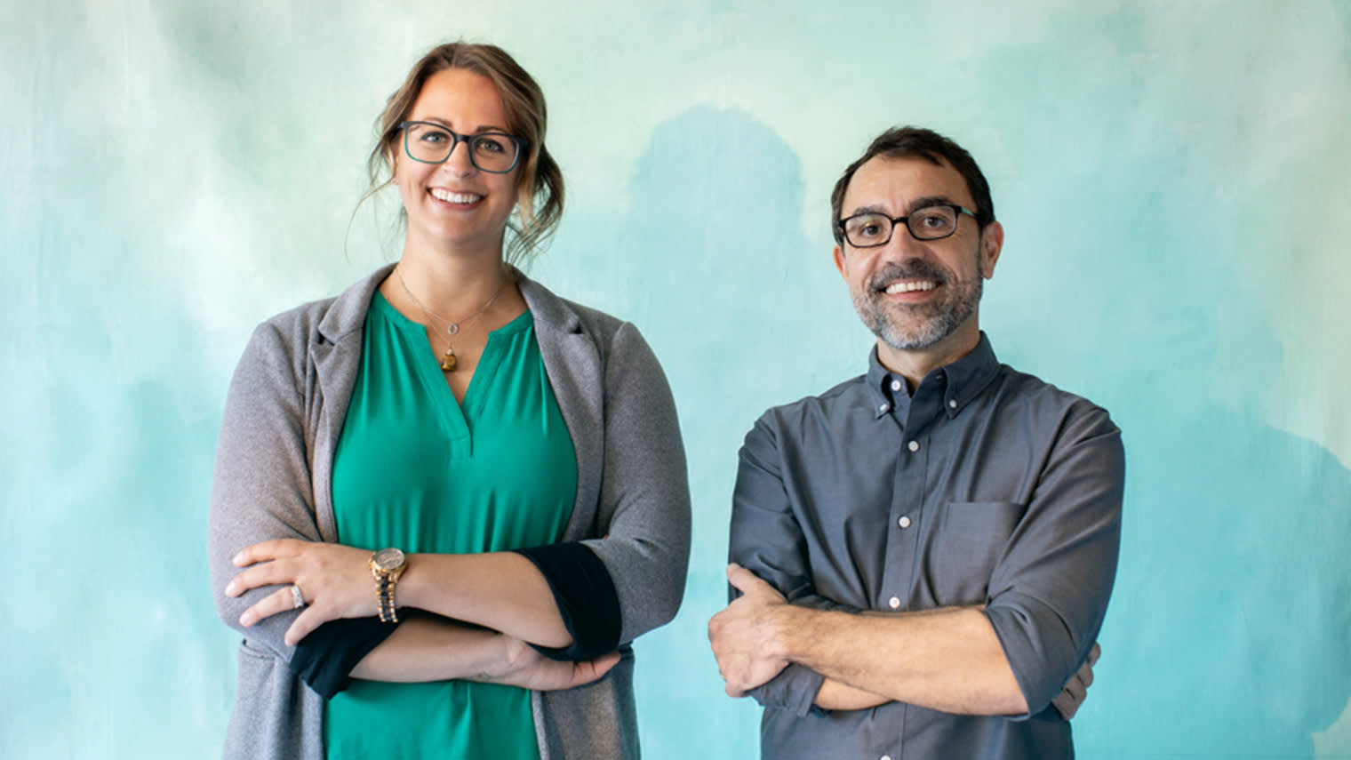 Nick and Ashley standing together in a photograph.