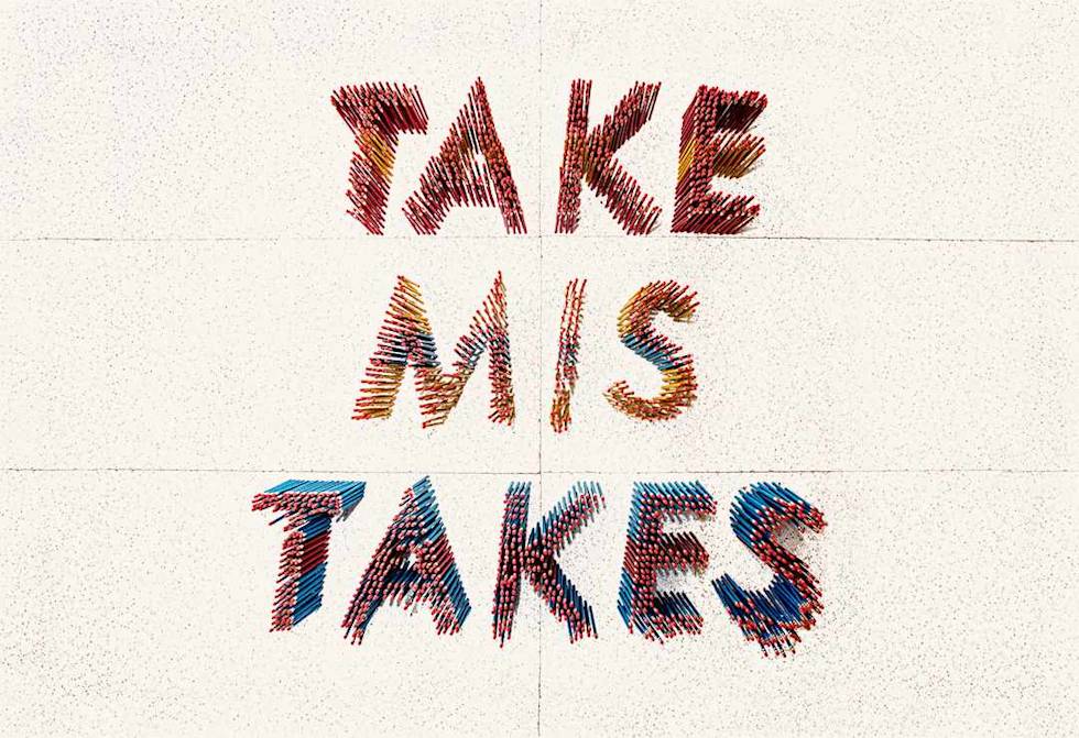 A sign that says, "Take Mistakes".