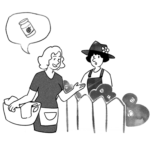 Two women talking by a fence