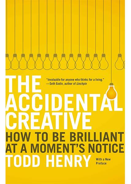 Book cover of "The Accidental Creative" featuring hanging light bulbs on yellow background with white and olive green text