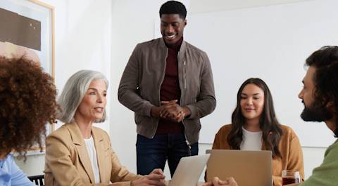 5 team members attending a meeting