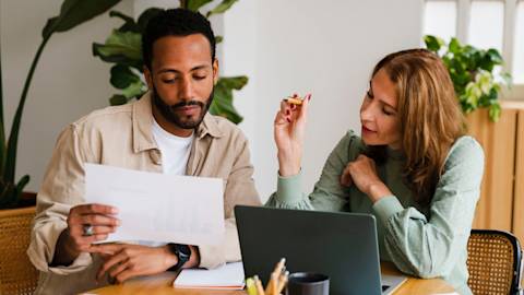Two people discussing content governance