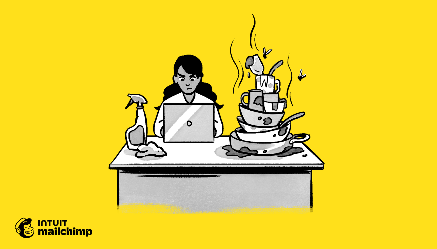 woman working on laptop with a messy desk