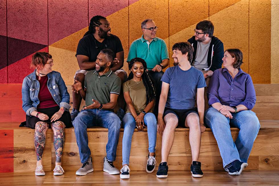 A group of Mailchimp engineers sitting as a group