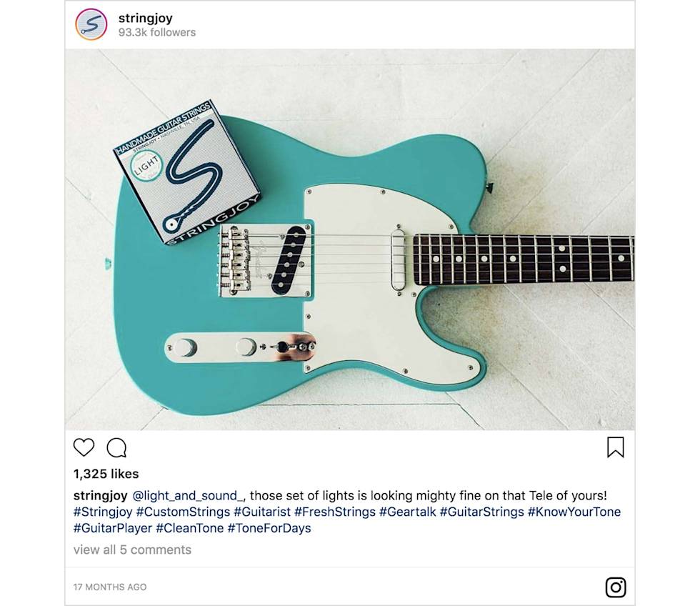 An Instagram post from Stringjoy featuring a guitar and pack of guitar strings