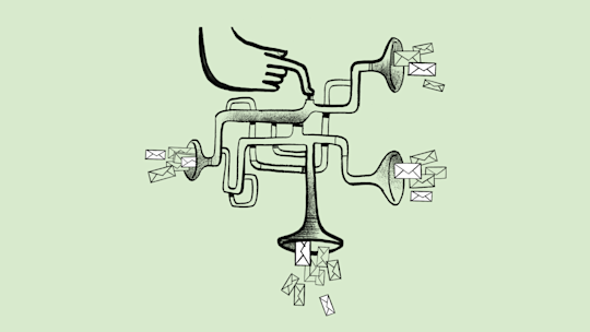 A hand pushing a button on a contraption that delivers mail