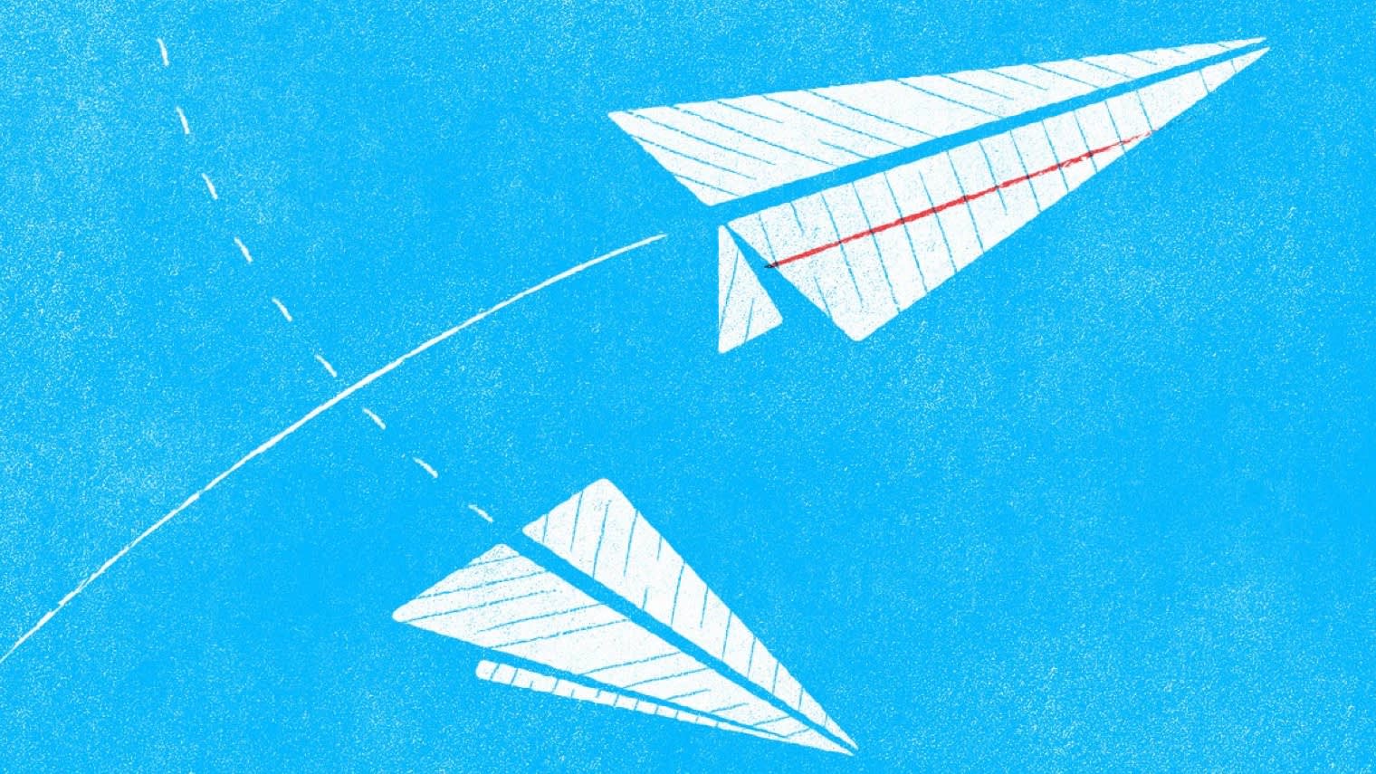 A couple of flying paper airplanes