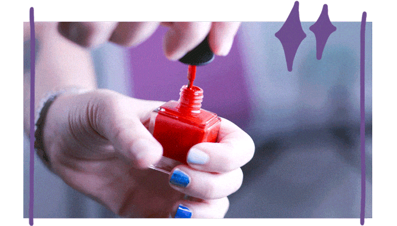 Melissa is dipping the polish brush into the polish