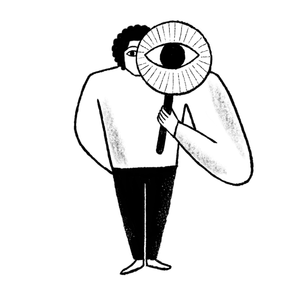 Man with magnifying glass over his eye